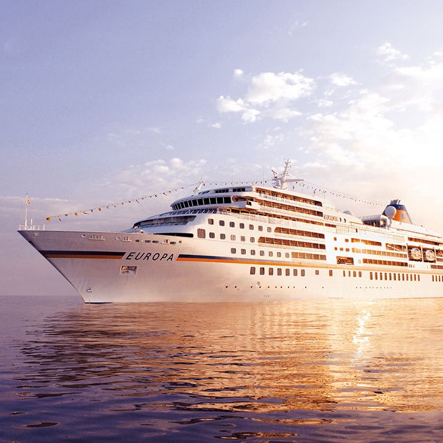 Cruiseship in sunset on open sea